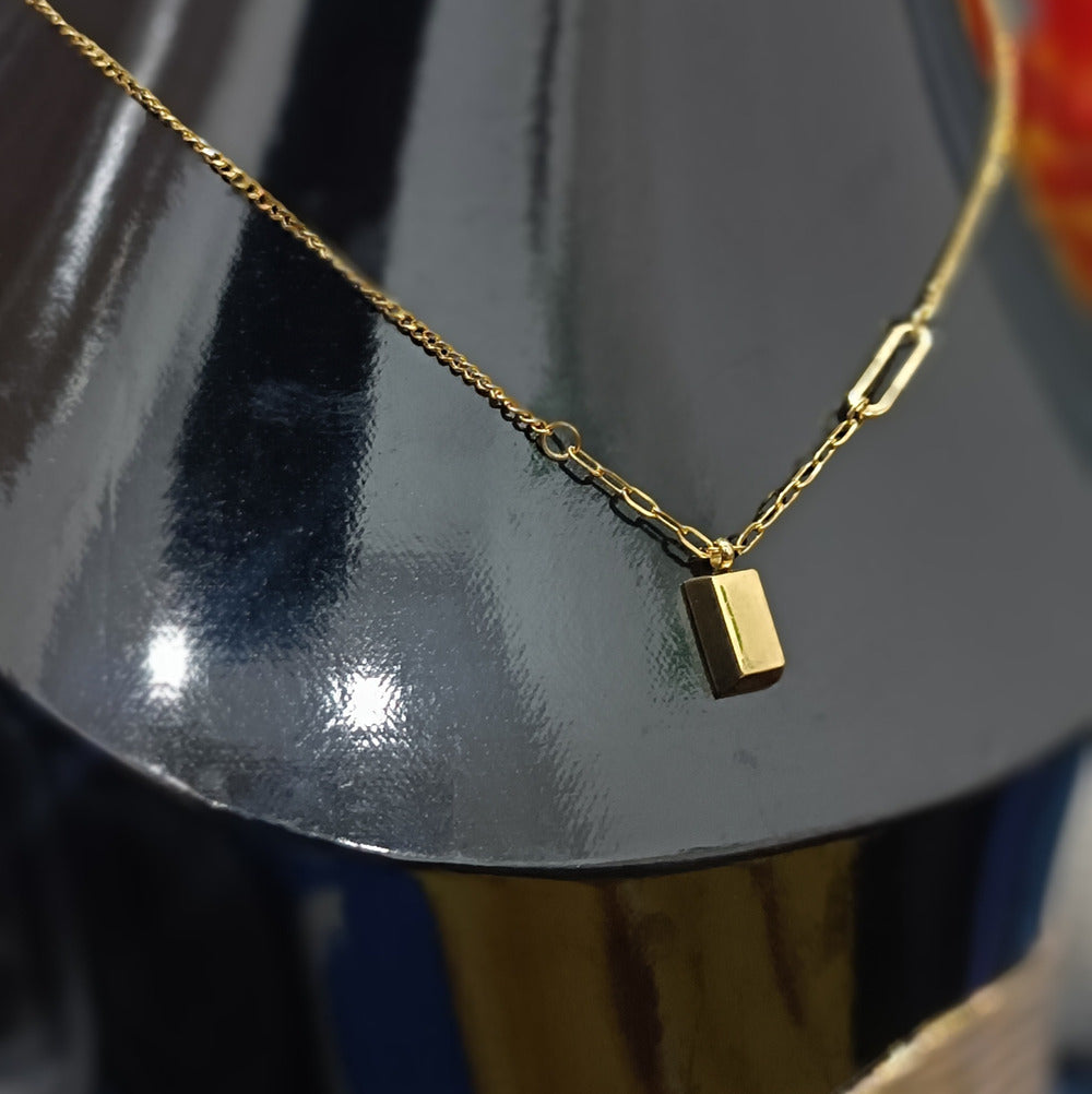Elegant Titanium Steel Necklace with Small Golden Brick Pendant