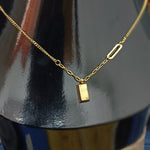 Elegant Titanium Steel Necklace with Small Golden Brick Pendant
