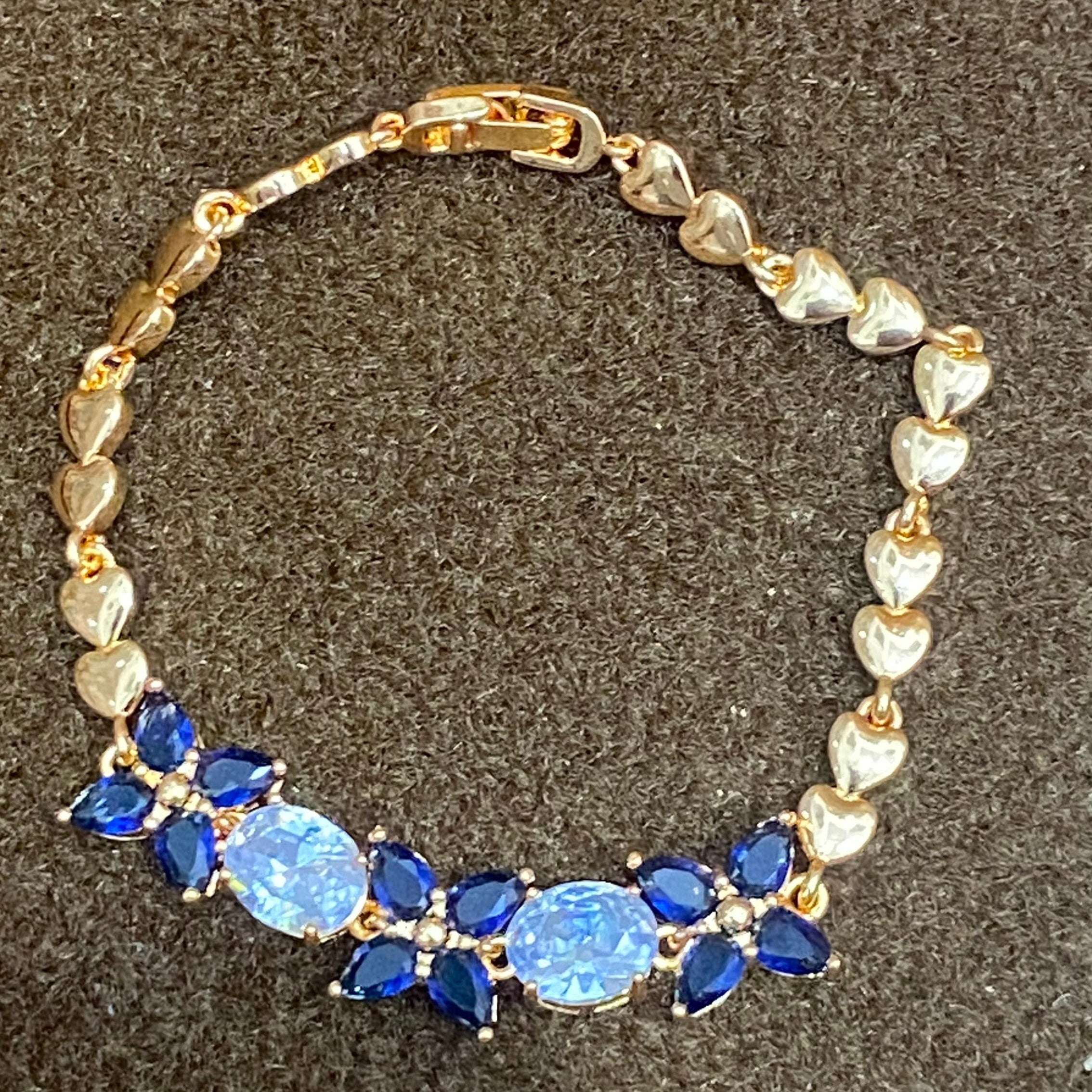 Golden Bracelet with Blue and White CZ Stones – Elegant Women's Jewelry