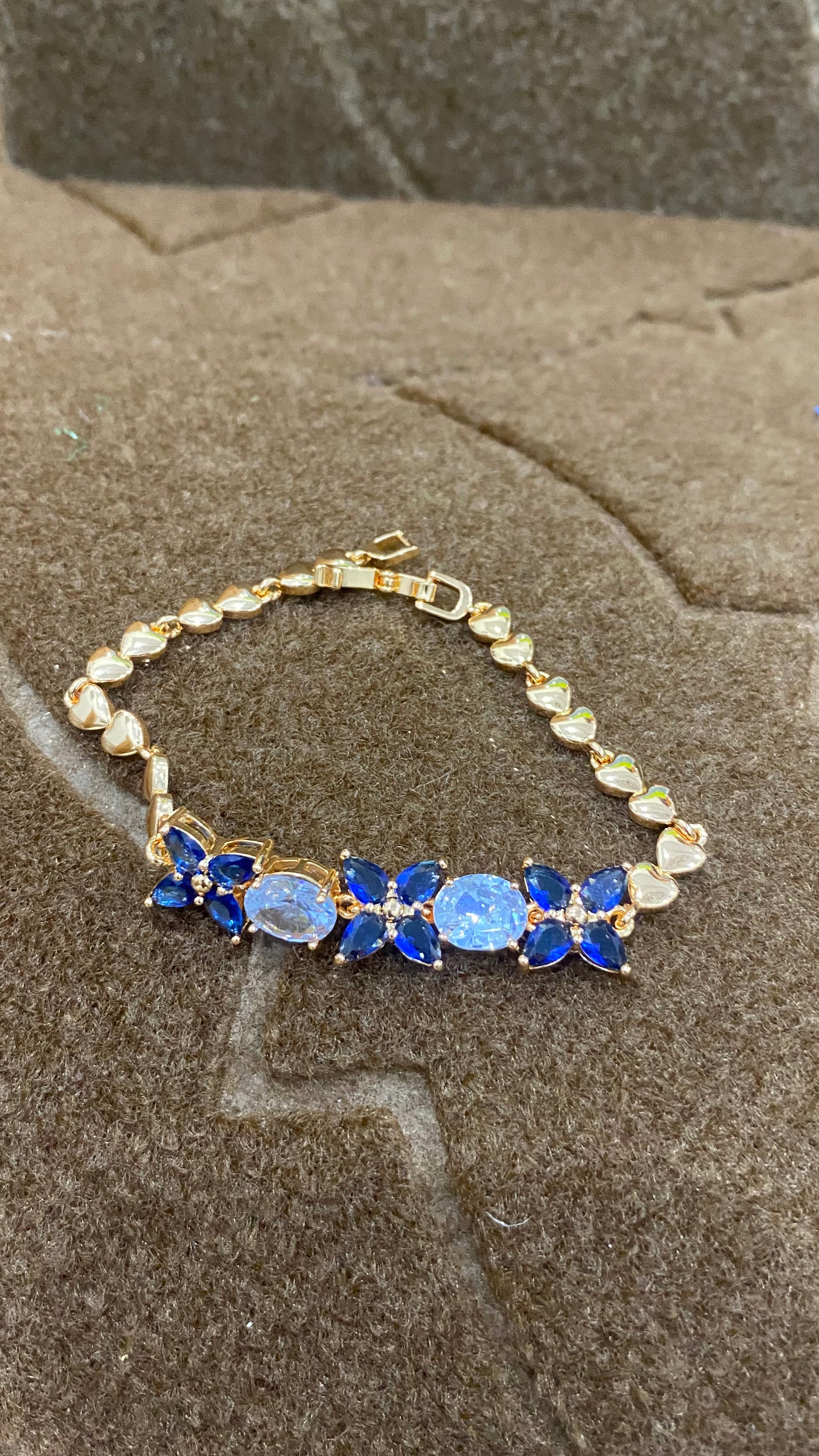 Golden Bracelet with Blue and White CZ Stones – Elegant Women's Jewelry