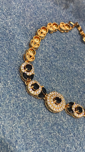 Golden Bracelet with Black and White CZ Circles – Elegant Women's Jewelry
