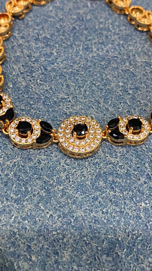 Golden Bracelet with Black and White CZ Circles – Elegant Women's Jewelry
