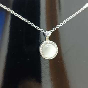 Elegant Silver Pendant Necklace with White Gemstone and Diamond Accents